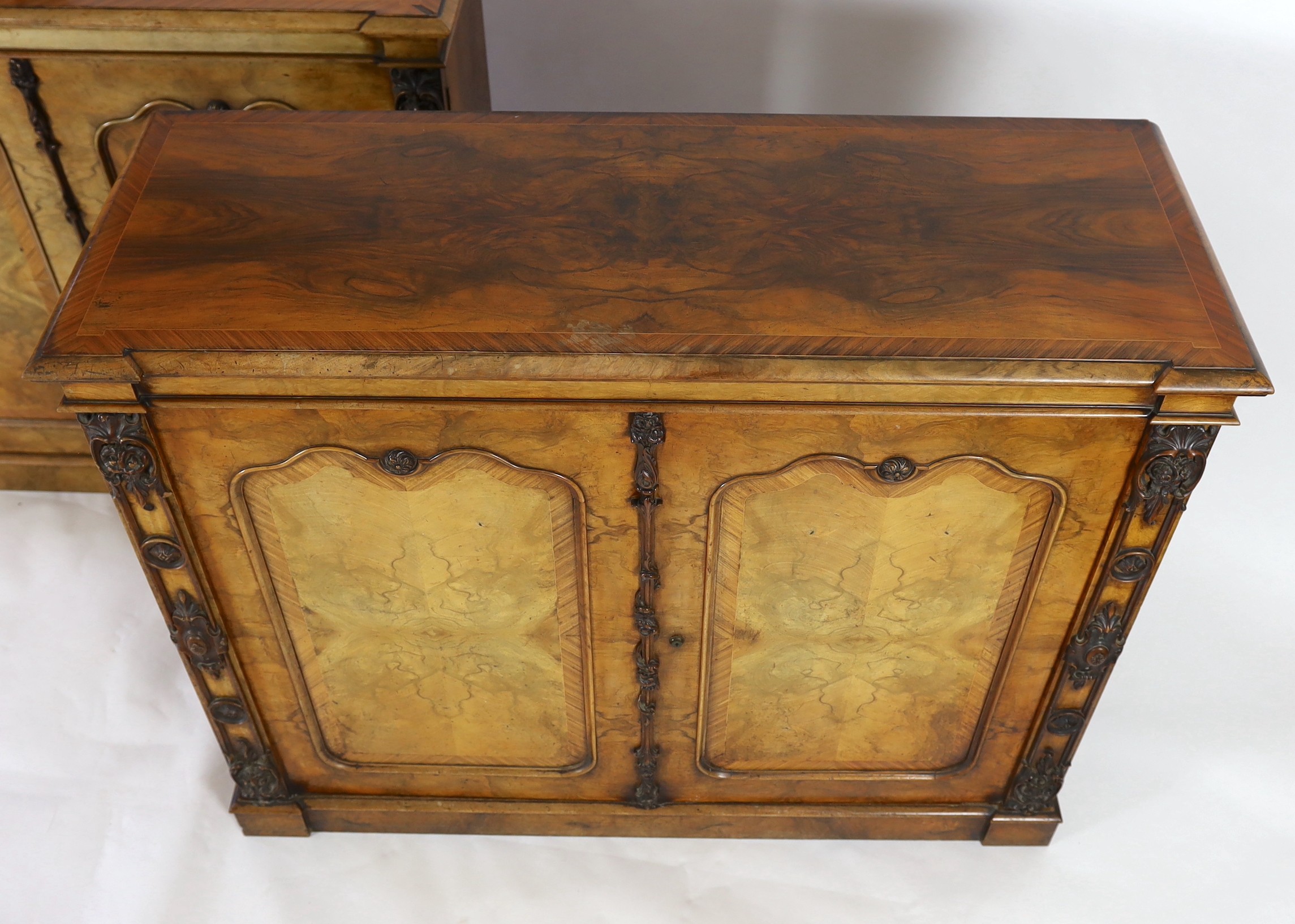 A pair of Victorian rosewood banded walnut collector's cabinets, W.143cm D.53cm H.114cm